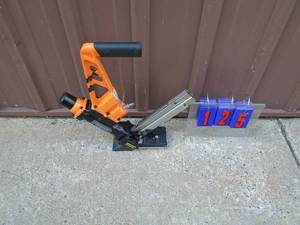 Freeman flooring nailer. Looks unused with box of staples. As shown.