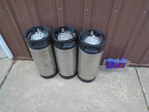 3 Liquid beverage stainless canisters. As shown.