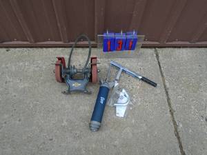 Barrel pump & remote grinder head. As shown.