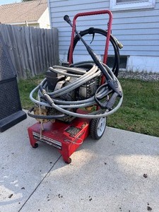 lot 3 image: Generac Pressure Washer with Hose and Spray Nozzle