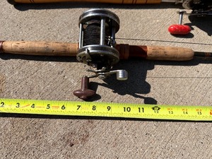 lot 42 image: Three Vintage Fishing Rods with Reels