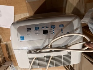 lot 211 image: GE Dehumidifier