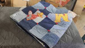 Cute home made blanket with ADAM across it