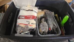 Tote of painters supplies