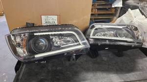 2 Spyder brand headlights new in box