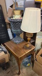 Side table and collection of vases and a lamp
