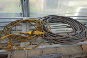 lot 109 image: 220 cord with adapter heavy duty