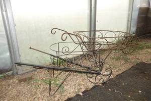 lot 115 image: 2 wire wheel barrow planters dcor