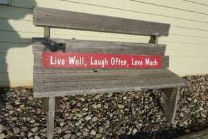 lot 169 image: Live Well. Laugh Often. Love Much Bench Sign included not currently installed