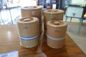 lot 210 image: oatmeal colored over and back canisters