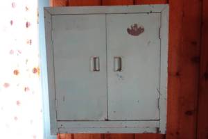 lot 250 image: Teal metal cupboard 24.5x11x26