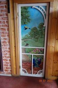 lot 58 image: Hummingbird Patio Door. Custom Painted 30x80