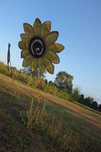 lot 92 image: Roughly 11 ft sunflower garden stake