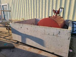 lot 19 image: 300 Gallon Diesel Tank with cement casement