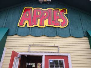 lot 100A image: Wooden apples sign