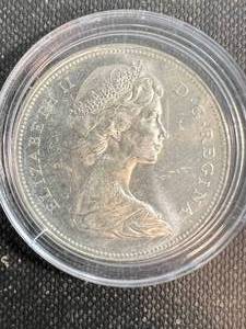 lot 08 image: 1966 CANADIAN SILVER DOLLAR UNC