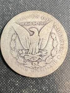 lot 24 image: 1889-CC US MORGAN SILVER DOLLAR
