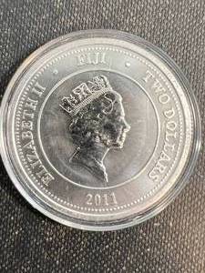 lot 25 image: 1 TROY OZ .999 FINE SILVER 2011 FIJI TAKU ROUND