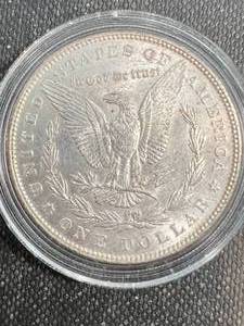 lot 35 image: 1889 US MORGAN SILVER DOLLAR UNC IN AIRTITE