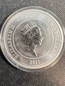 lot 40 image: 1 TROY OZ .999 FINE SILVER 2011 FIJI TAKU ROUND