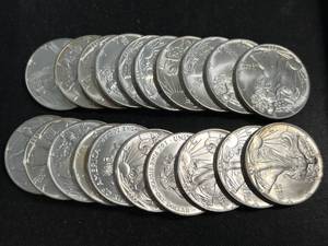 lot 65 image: ROLL OF 20 AMERICAN SILVER EAGLES ALL 1988 BU