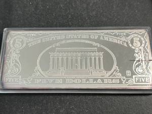 lot 68 image: 4 TROY OZ .999 FINE SILVER $5 BILL DESIGNED BAR