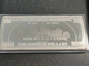 lot 72 image: 4 TROY OZ .999 FINE SILVER $100 BILL DESIGNED BAR