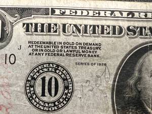 lot 99 image: 1928 US $100 REDEEMABLE IN GOLD FEDERAL RESERVE NOTE