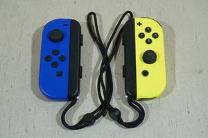 lot 5 image: Nintendo Switch Joy-Cons -Neon Blue & Yellow