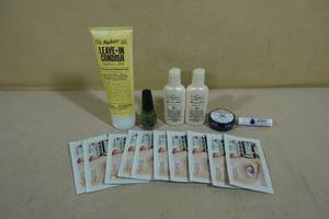 lot 32 image: Assorted Selfcare Products -Leave-in Conditioner, Nail Polish, Lotion