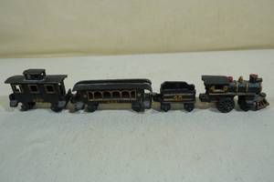 lot 49 image: Vintage Cast Iron Train Set