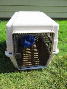 lot 46 image: Plastic Pet Taxi Approximately 28L x 21W x 22H