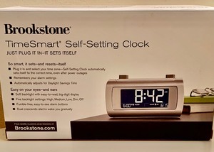 lot 100 image: Brookstone Clock NEW In Box