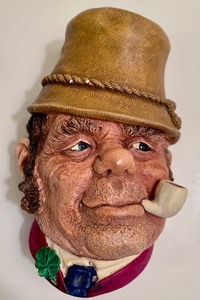lot 129 image: Two Vintage Bossons Clay Face Hangings