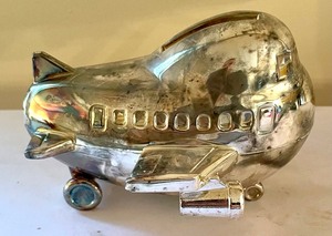 lot 468 image: Vintage Royal Brunei Model Airplane and Silver Plated Airplane Bank