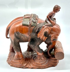 lot 38 image: Wood Carved Elephant and Rider Figurine