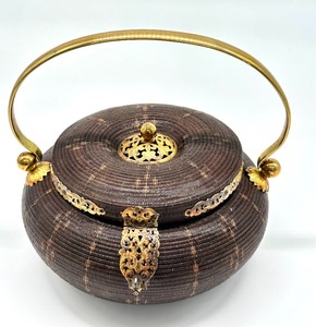 lot 34 image: Vintage Woven Teapot
