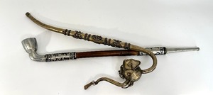 lot 192 image: Two Ornate Metal Pipes
