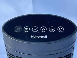 lot 414 image: Honeywell Oscillating Fan  Heater Model HCE351B