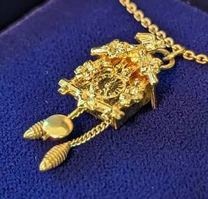 lot 230 image: 14k Gold Cuckoo Clock Pendant and Chain