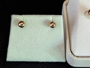 lot 232 image: Three Pairs of 14k Gold Stud Earrings