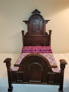 lot 15 image: Antique Eastlake Style Doll Bed