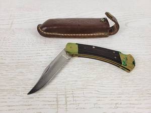lot 231 image: Vintage BUCK 110 Folding 4 Blade Knife