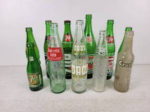 lot 284 image: (11) Vintage Soda Bottles - 7up, Squirt, Dads Root Beer, Tab, Crush and Diet Rite