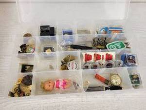 lot 320 image: Organizer with Many Little Trinkets - Pins, Emblems, Shark Tooth, Tokens, Watch and More