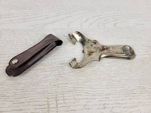 lot 330 image: Vintage Nicollet Oil Co. Opener and Cabin Bar of Nicollet, MN Toenail Clipper