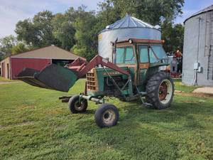 lot 1 image: Oliver 1650 Gas Tractor, Model 265-21048 with Schwartz Loader - SEE VIDEO