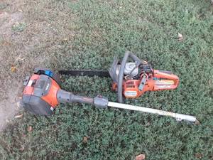 lot 7 image: Husqvarna chainsaw and power head for parts or repair