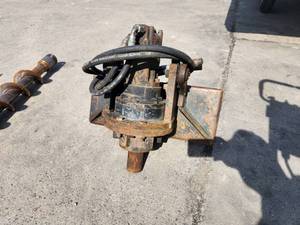 lot 12 image: Toro DingoBobcat 6 Auger Attachment