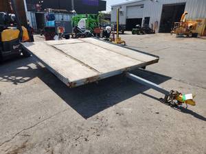 lot 9 image: 1996 Karavan 10 Single Axle Tilt-Bed Snowmobile 2-sled Trailer